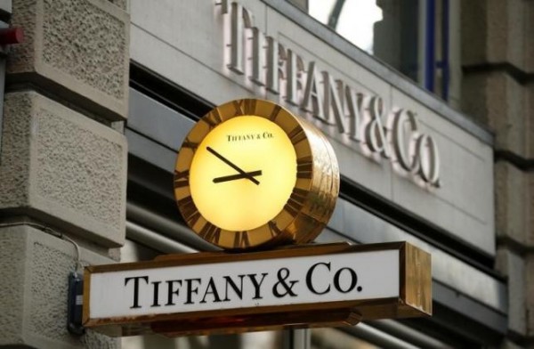 A clock is placed in front of a store of U.S. jeweller Tiffany in Zurich